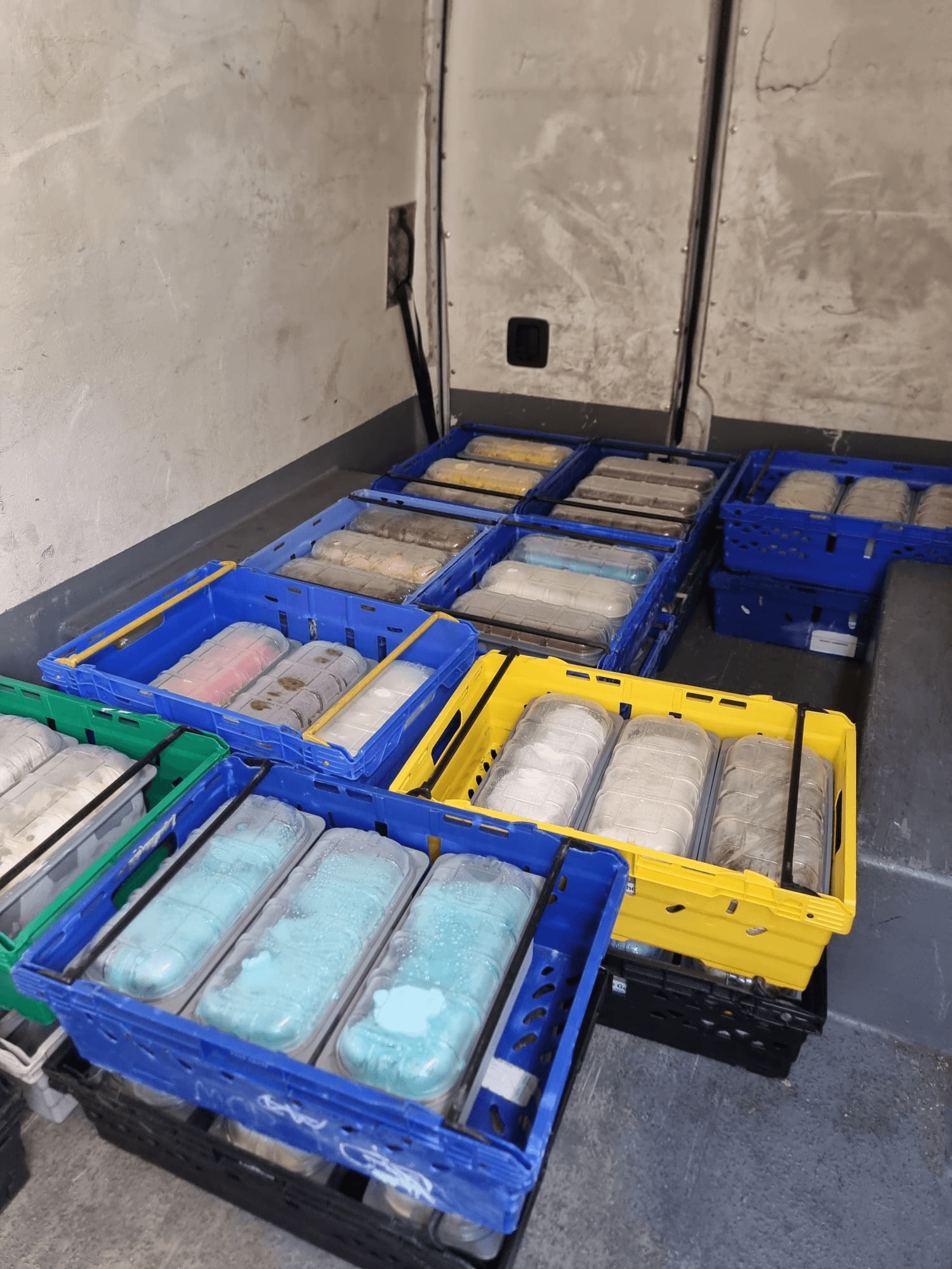Chilled food trays crated for temperature-controlled delivery