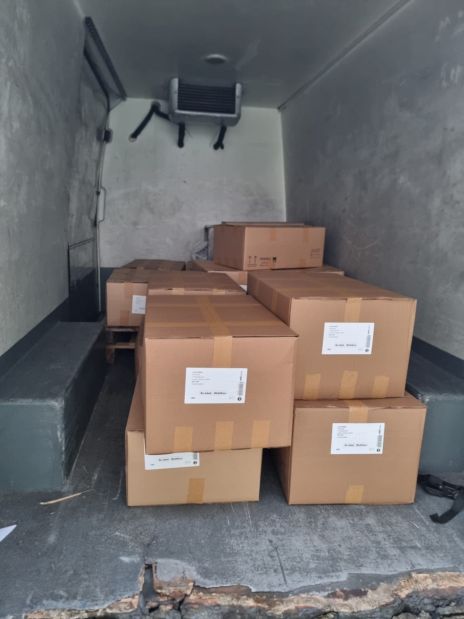 Boxes loaded in the back of a delivery van