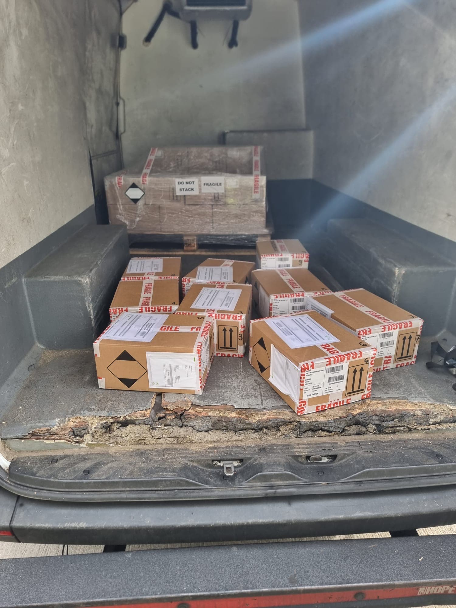 Fragile-marked parcels staged for delivery